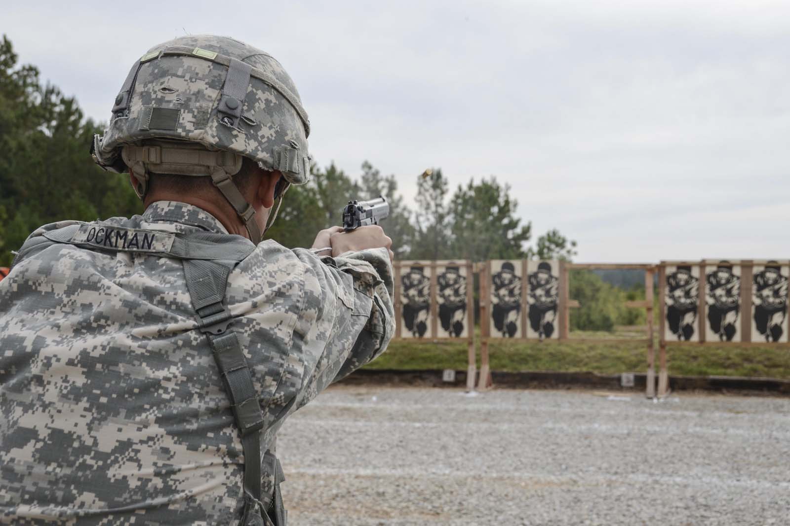 Louisiana National Guard's Spc. Cameron Ockman with B Company, 1st Battalion, 244th Aviation Regiment, fires a 9 mm pistol during the General George Patton match at the Adjutant General's Marksmanship Match at Camp Beauregard in Pineville, Louisiana, Oct. 20, 2017. Ockman and 73 other Airmen and Soldiers competed over the course of two days for a spot in the Governor's Twenty. (U.S. Army National Guard photo by Sgt. Noshoba Davis)