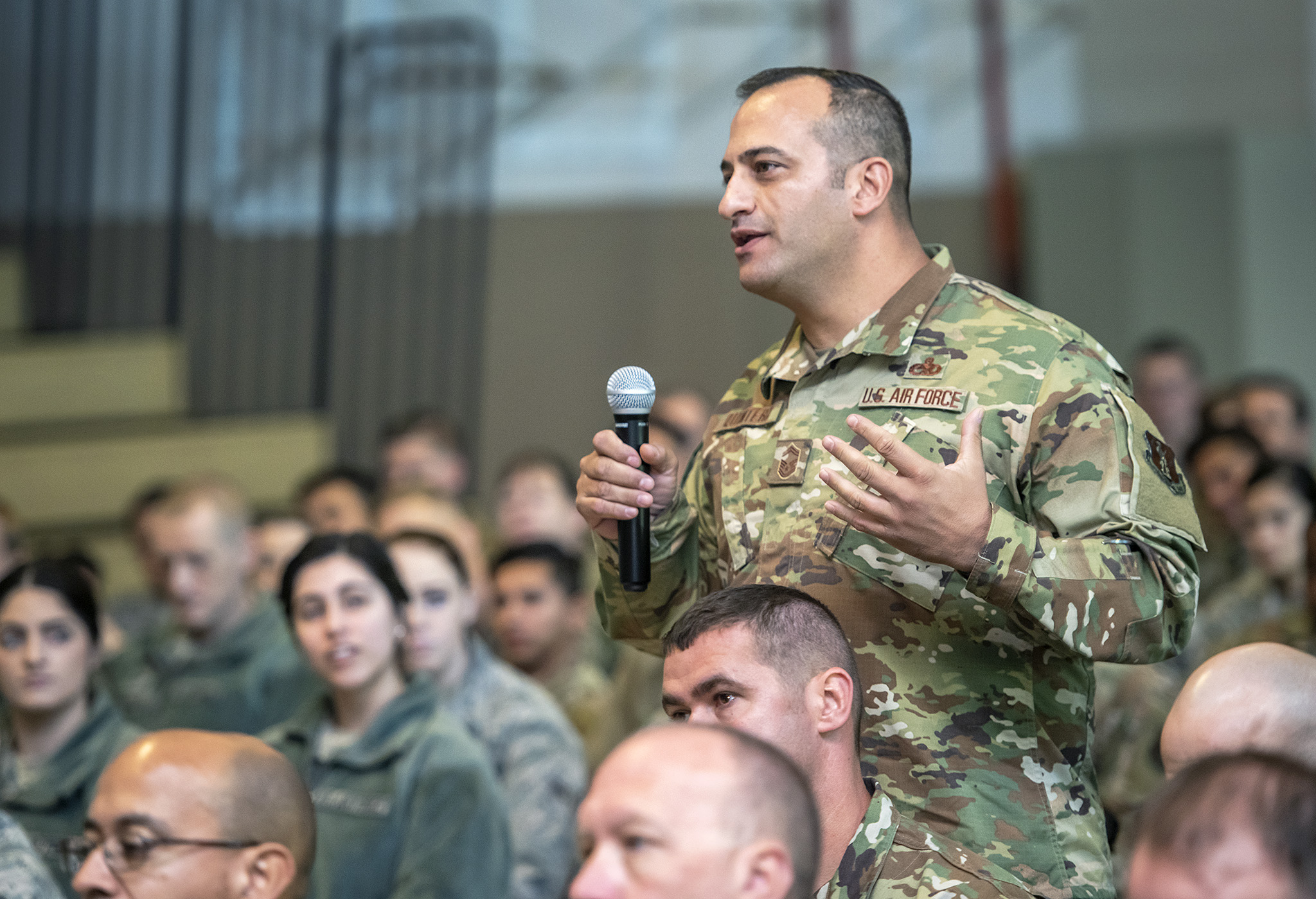 Senior Master Sgt. David Quintero, 159th Maintenance Group, Louisiana Air National Guard, asks a question about the future of the F-15 program to U.S. Air Force Lt. Gen. L. Scott Rice, director of the Air National Guard, during an “All Call” assembly at Naval Air Station Joint Reserve Base New Orleans, Nov. 3, 2019. Rice met with Wing leadership and visited Airmen throughout the unit to learn about their mission and to answer questions that Airmen had for Air National Guard leadership. (U.S. Air National Guard photo by Senior Master Sgt. Dan Farrell)